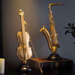 Decorative Objects Figurines Modern Resin Violin Model Home Decoration Nordic Music Figurine Saxophone Statue Art Sculpture Office Desk Accessorie 230614