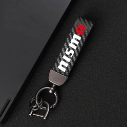 Keychains Carbon Fiber Leather Keychain 360 Degree Rotating Horseshoe Key Rings For Nissan Nismo Tiida Teana Skyline XTrail Qashq1260T