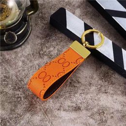 2023-3 High Quality Keychain Classic Exquisite Luxury Designer Car Keyring Zinc Alloy Letter Unisex Lanyard Gold Black Metal Small Jewelry Lov