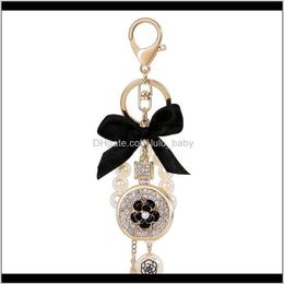 Lovely Cute Bow Pearl Flower Perfume Bottle Fashion Ins Luxury Designer Diamond Rhinestone Bag Charms Tassel 8Zlh6 Nen2Y83251882470