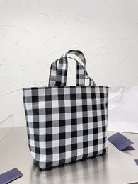 Plaid canvas storage bag age cute eye-catching design sense College wind open shoulder bag large capacity strong load bearing