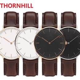Japan Quartz Movement Classic Designer Watches Mens 40mm Womens 36mm Genuine Leather Top Quality Wristwatches Gift With Original B205I