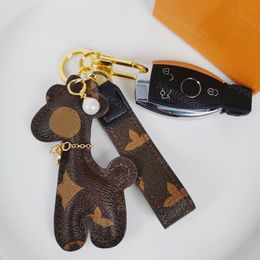 Cute Key Holder Giraffe Keychains Luxurys Designers Pu Keychain Puppy Car Key Keyring Porte Bag Charms Lanyards Mens Fashion Bag Accessories