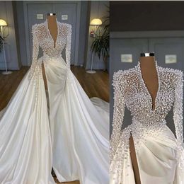 2022 Luxus Bling Meerjungfrau Brautkleider Tiefem V-Ausschnitt Illusion Perlen Kristall High Side Split Arabisch Satin Brautkleider Robe de ma241A