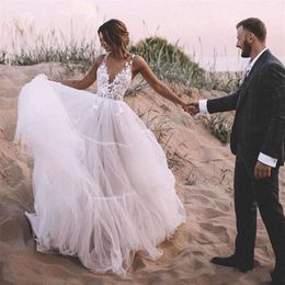 Charming Backless Beach Wedding Dresses Deep V Neck Bohemian Lace Bridal Gowns A Line Sweep Train Tulle robe de mariee295Q