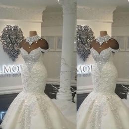 New Sexy Luxury Dubai Arabic Mermaid Wedding Dresses High Neck Illusion Lace Appliques Crystal Beaing Hollow Back Tulle Formal Bri209k