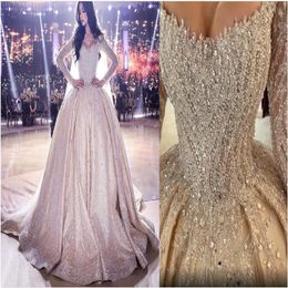 2020 Plus Size Arabic Aso Ebi Luxurious Crystals Pearls Beaded Wedding Dresses Long Sleeves Bridal Dresses Sparkly Wedding Gowns Z195f