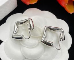 French niche geometric glossy graphic earrings trend personality simple cold wind earrings Top Quality