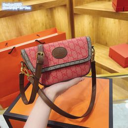 Factory wholesale ladies shoulder bags 6 colors this year's popular print backpack flip wear-resistant leather handbag simple color matching female mobile phone bag