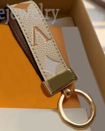 New 23ss designer keychains multicolor women men brown leather bag wallet lanyard plated accessories letter womens mens keychain