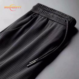 Mens Pants Ice silk breathable hole mens casual trousers beam feet pants Slim wild nine points sports fitness Fishing Cycling shorts 230620