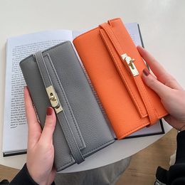 Designer luxury women purse pure color high quality pu material fashion Versatile handbag with multiple slots litchi grain medium and long