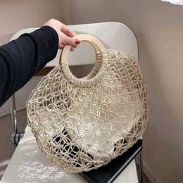 New Wooden Handle Mesh Bag Hollow Grass Woven Fashion Handbag Personalised Mesh Bag 230621