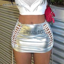 Skirts ANJAMANOR Metallic Silver PU Leather High Waisted Mini Skirts Sexy Clubwear Rave Clothes Women Hollow Out Bandage Skirt D82-BI11 J230621