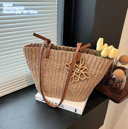 wholesale ladies shoulder bags 3 Colours elegant romantic beach holiday straw backpack large capacity woven tote bag small fresh contrast leather handbag 366#