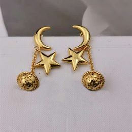 New designed TRIOMPHE Arch GOLD Star Bell PEADANT EARRINGS IN BRASS WOMEN EAR STUDS Designer Jewellery CE LINE901190