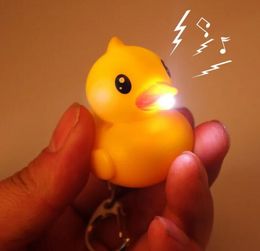 100pcs Creative LED Yellow Duck Keychain with Sound Animal Series Rubber Ducky Key Ring Toys Doll gift Toy Party Favour Free Shipping