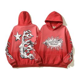 23s American fashion label hellstar high street ins with the same clay print flame red hooded sweater for both men and women