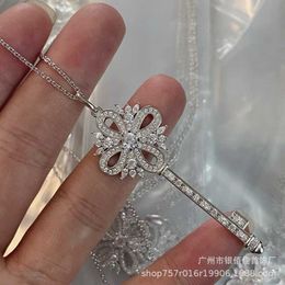 Designer's Seiko Brand sterling silver Christmas snowflake necklace is versatile in all seasons. Simple sun flower crown key pendant sweater chain