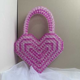 2023 New Women's Love Coloured Beaded Handmade Product with Small Design Skew Cross Decoration Peach Heart Bag 230625