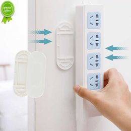 New Wall-Mounted Holder Punch-Free Plug Fixer Self-Adhesive Power Strip Socket Fixer Plug Holder Storage Hook For Kitchen Office