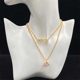 2023 New Fenjia Letter Water Diamond Double Layer Twisted Fashion Versatile Necklace Brass Sweater Chain