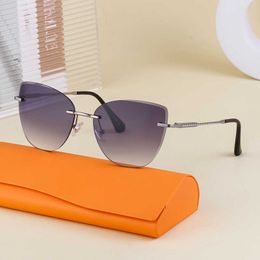 Brand Fashionable cat's eye trendy frameless cut edge driving UV resistant sunglasses for women glasses