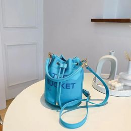 the tote leather BUCKET bag Womens handbag Luxury tote Drawstring shoulder hot fashion Designer buckets THE Bag Classic pull closure Backpack with chain strap