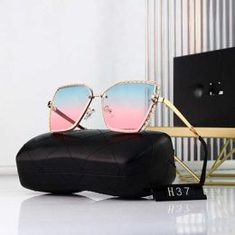 Wholesale of Frameless large frame female sunglasses Xiaoxiang new glasses