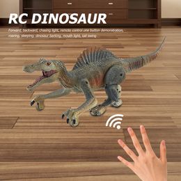 Electric/RC Animals 2.4GHz Electric Dinosaur Interactive Toys 5 Channel Mechanical Dinosaur with Spray Music Lights Animal Model Simulation for Kids 230625