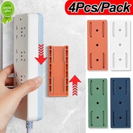 New 4Pcs Row Plug Holder Self-Adhesive Desktop Socket Fixer Punch-Free Wall Mount Power Strip Holder Socket Storage Bracket Stand