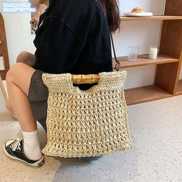 Factory wholesale ladies shoulder bags 2 colors summer holiday beach crocheted beach bag small fresh woven straw backpack hollowed out western style handbag 7079#