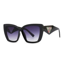 Wholesale of Hot selling Han Chaoliu Street photo cat's eye large frame inverted triangle sunglasses 9138