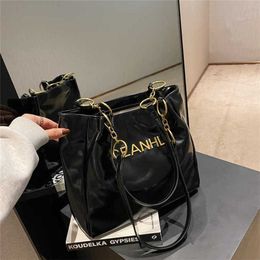 This year's popular large capacity tote bag new fashion versatile commuting tote bag texture trend shoulder bag 50% Clearance sale