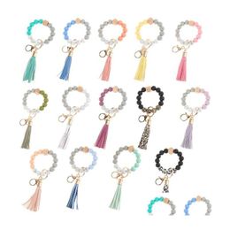 Keychains Lanyards 12 Colours Sile Beads Tassel Bead String Bracelet Keychain Food Grade Leopard Wooden Bracelets For Women Girl Ke Dhrr4