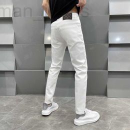 Men's Jeans designer Xintang New European Goods Spring and Summer Slim Feet Elastic Casual Pants Trend MFUF