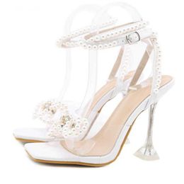 Sandals New Women 2023 Summer Sexy Perspex Crystal High Heels Party Wedding Shoes Square Toe Pearls String Bowknot Pumps 230511