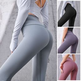 Contrazione addominale senza cuciture e asciugatura rapida Pantaloni sportivi da donna color pesca Fiess attillati a vita alta Nude Running Hip Lifting Yoga Pants