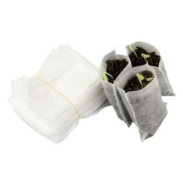 Other Garden Supplies Patio Lawn 100Pcs/Pack Environmental Protection Non-Woven Nursery Pots Seedling Raising Bags 8X10Cm Fabrics Wh Dhmry