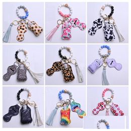 Keychains Lanyards 12 Colors Wooden Tassel Sile Bead String Bracelet Keychain Bag Car Key Chain Wristband Hand Sanitizer Holder Wi Dhm93