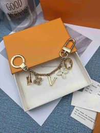 Keychains 2023 New European and American long chain hot pink flower key ring belt original box