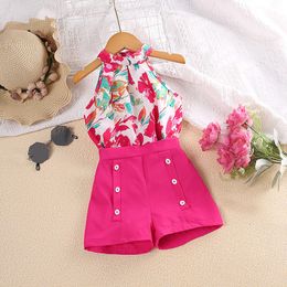 Clothing Sets 2023 Girls Summer Suit Hanging Neck Sleeveless Printed Top And Solid Colour Button Decorated Shorts Polyester Cool Cute 230630