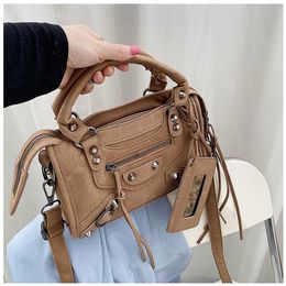 Baobao New Fashion Versatile Rivet Litchi Pattern Locomotive Women's Crossbody Handbag with a Texture Sense Bag model 7569