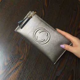 and ultra-thin wallet with tassels for women's long zipper soft cowhide handbag leather clip holder new style model 7569