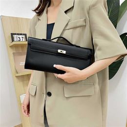 for Women 2023 New Simple and Westernised Handheld Trend Versatile Shoulder Stick Bag Inventory 399