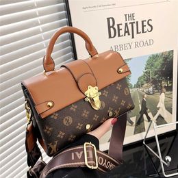 Small 2023 New Printed Women's Fashion Handbag Riveted One Shoulder Crossbody Bag Bags model 7569