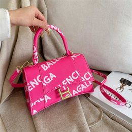 Net-red 2023 new autumn and winter handbag advanced texture hourglass women's bag model 7569