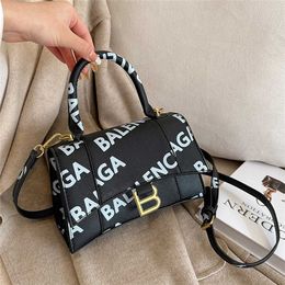 Bags Women's 2023 New Fashion Family Paris Letter Printing Style One Shoulder Crossbody Handbag Hourglass Bag model 7569