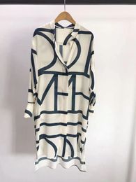 Toteme geometric letter printed silk silk silk dress, medium length shirt skirt