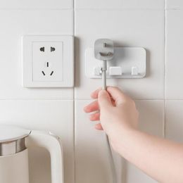 Hooks Wall-Mounted Hook Punch-free Power Plug Socket Wall Storage Holders Self Adhesive Hanger Kitchen Bathroom Toothbrush Rack